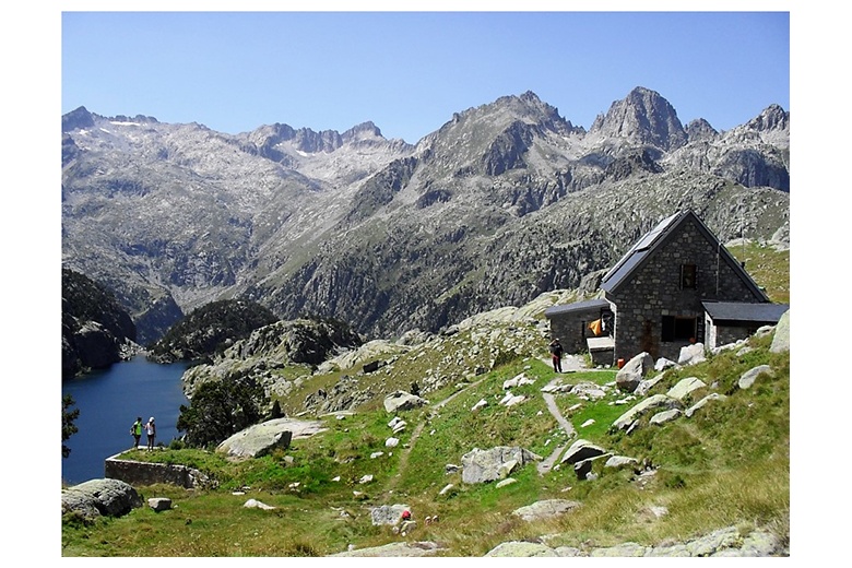 ventosa i calvell hut with serra de tumeneia at the background and estany negre just on the left edge of the image
